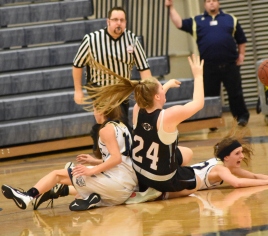 Nicole Bareis fights for a loose ball
