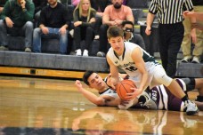 Cook fights for a loose ball